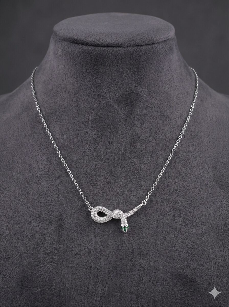 Silver-Tone Coiled Snake Pendant Necklace with Clear Pavé Stones and Green Accents — view 2 of 3