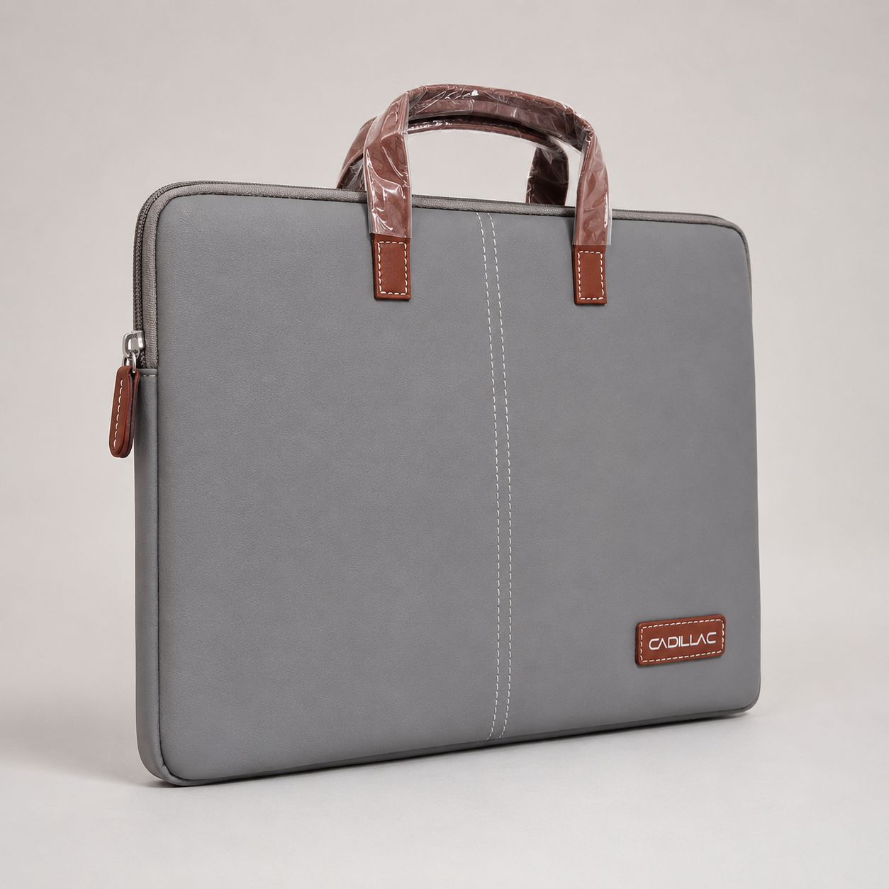 Grey laptop sleeve bag angled view showing side zip closure