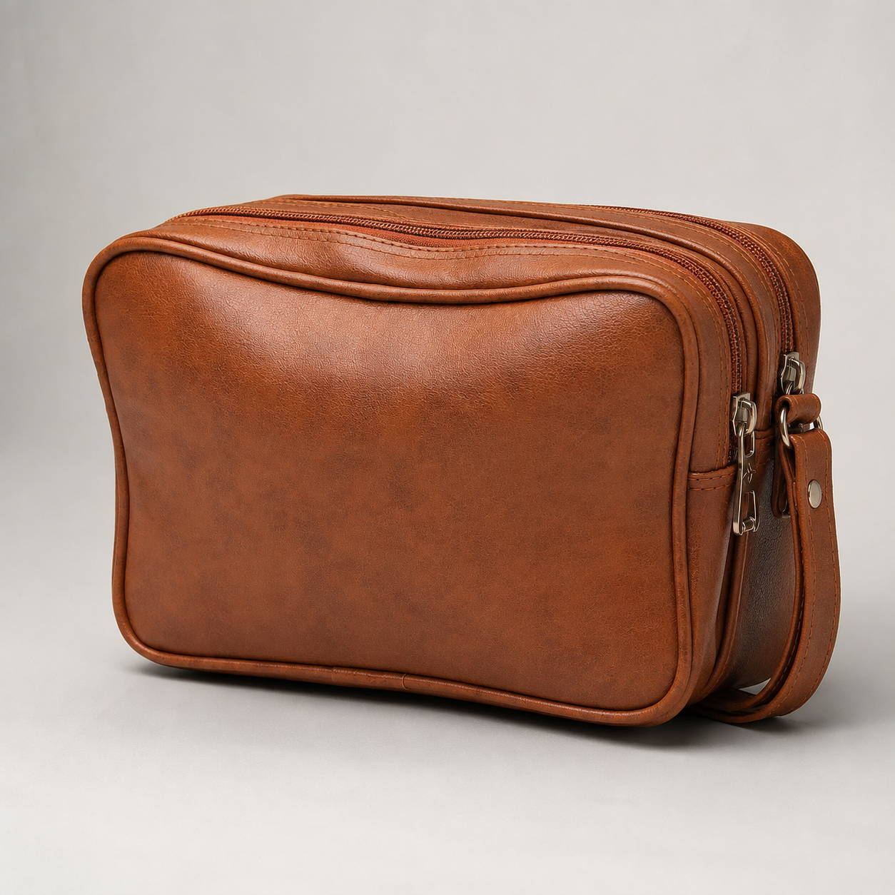 Tan faux leather crossbody bag rear view with strap