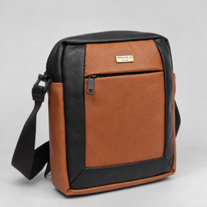 Tan and black two-tone faux leather crossbody sling bag front view
