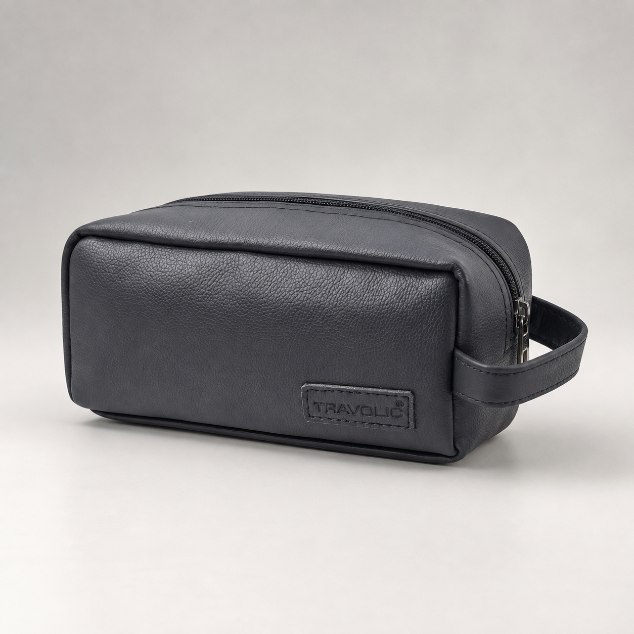 Black toiletry pouch angled view showing top zip opening