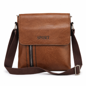 Brown faux leather crossbody sling bag with front zip pocket, front view